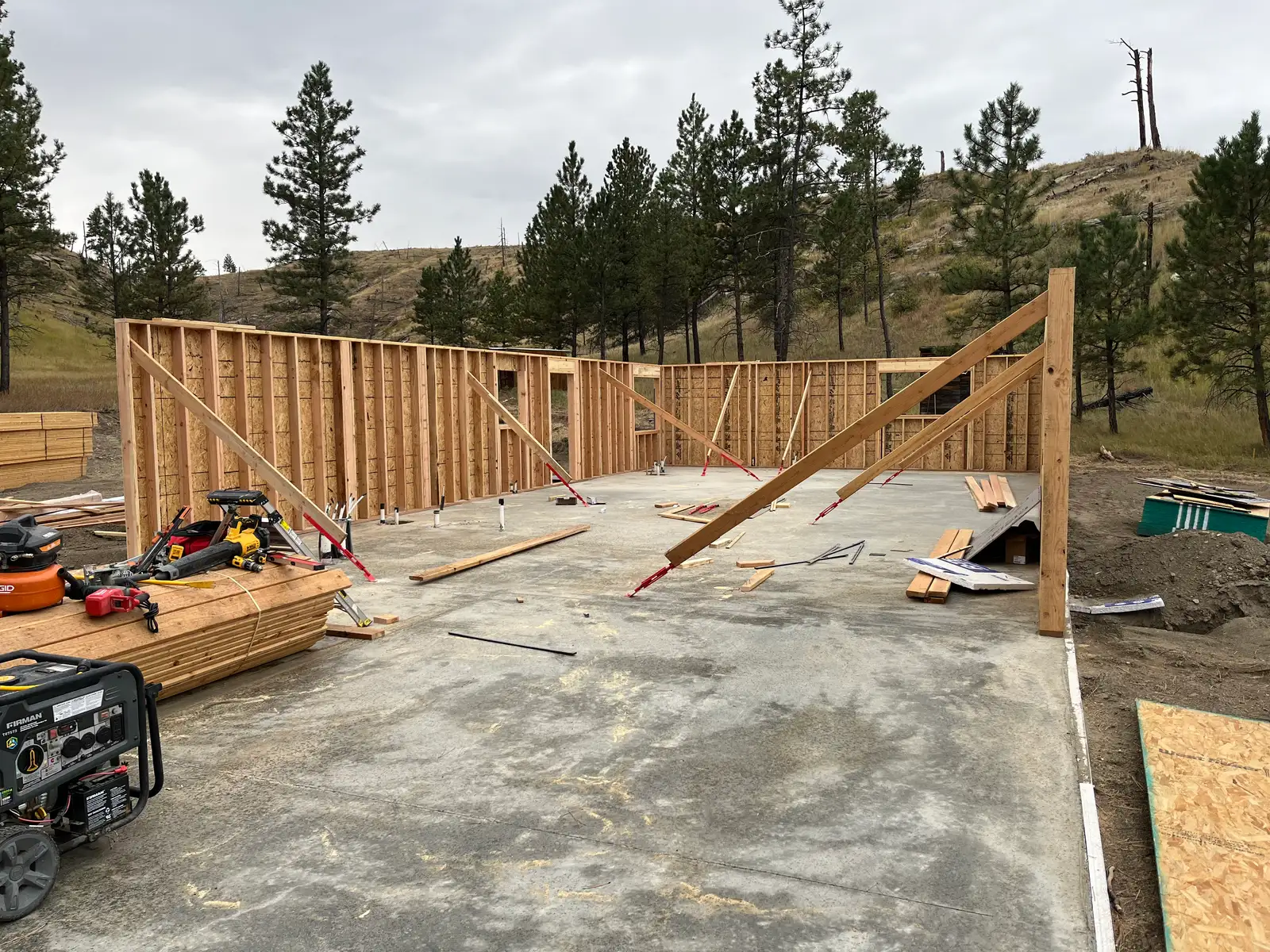 Exterior walls being framed on a stick-built shop home in Montana