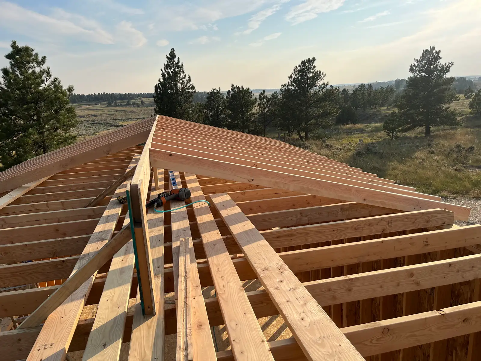 Roof framing in progress on a Hammer Down Construction build