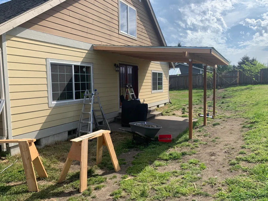 New siding and a covered patio added to a Montana home